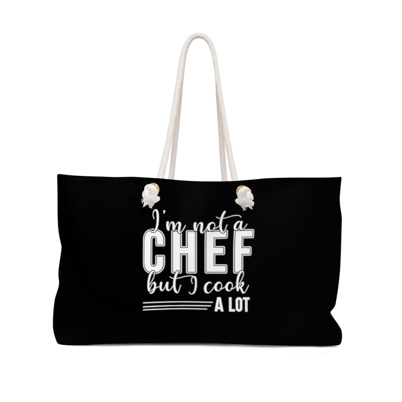 I'm Not A Chef But I Cook A Lot Black Weekender Bag Printify