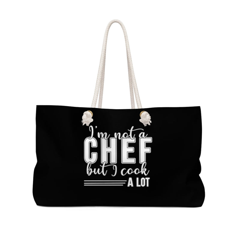 I'm Not A Chef But I Cook A Lot Black Weekender Bag Printify