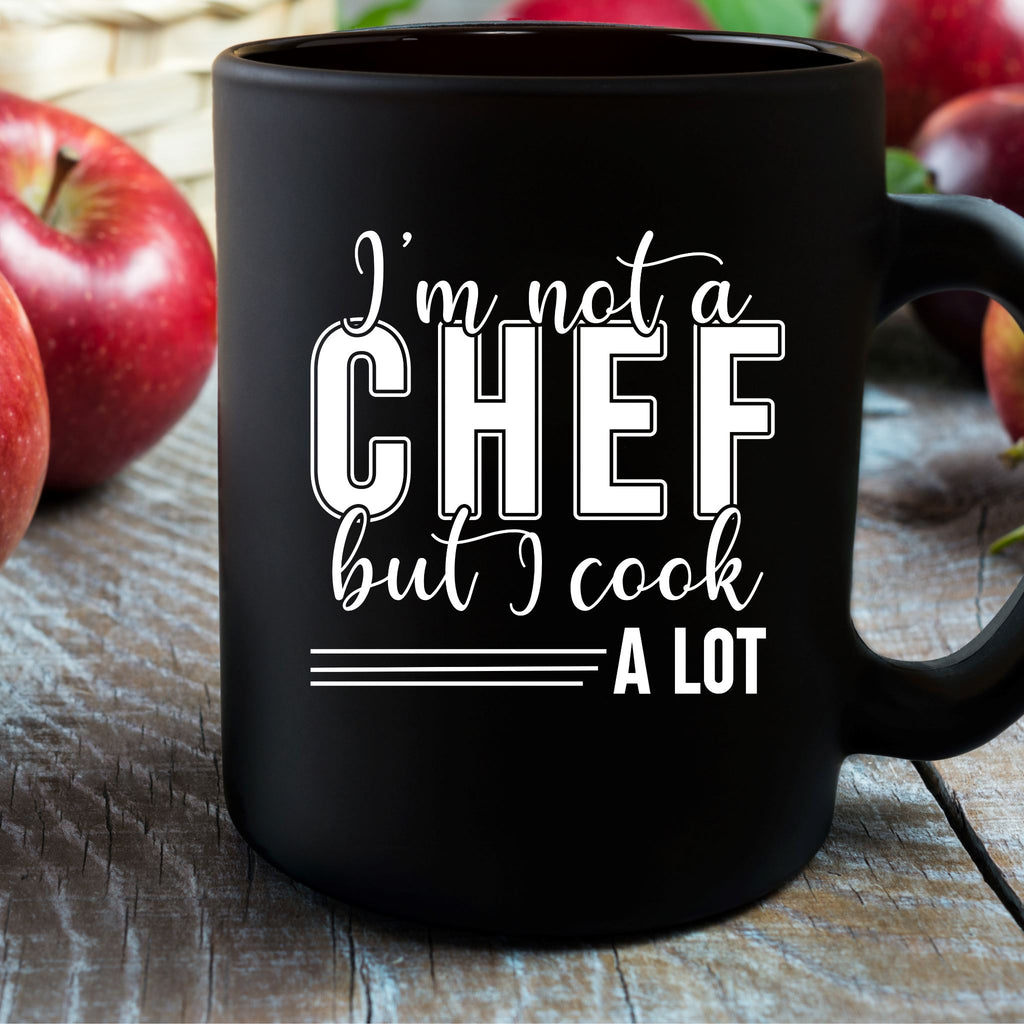 I'm Not A Chef But I Cook A Lot 15 oz Black Glossy Mug Lifestyle by Suncera